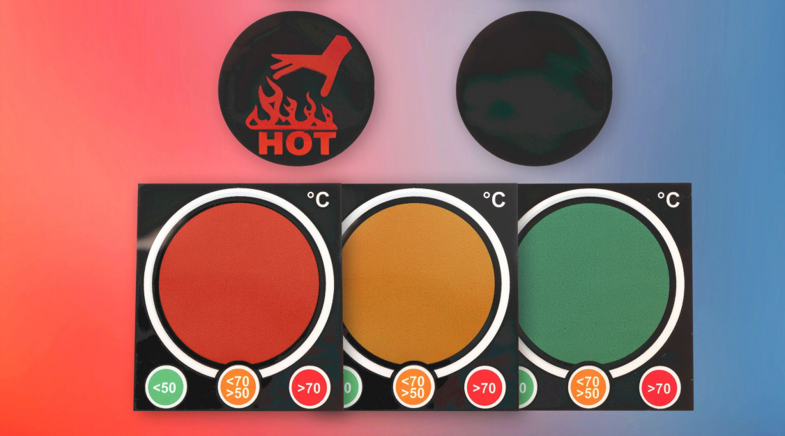 Die selbstklebenden Hitzewarn-Messpunkte Hot-Hand (oben) und Large Traffic Light von Kager warnen vorbeugend vor dem Kontakt mit heißen Oberflächen. - © Kiefer-Industriefotografie