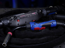 Intermediate drive for manual welding torches