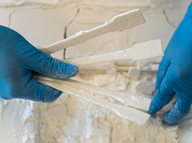 Tensile bars manufactured using the polymer powder bed fusion process, which are used to measure powder aging