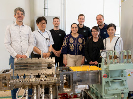Group photo of Kurimoto and SKZ at the handover of the S2KRC mixer at the SKZ Technical Center